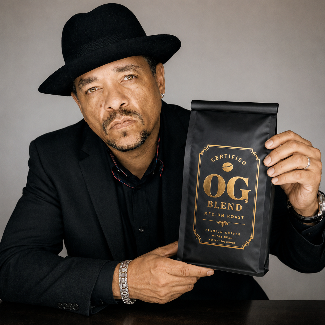 OG Network brand ambassador holding the Certified OG Blend coffee bag